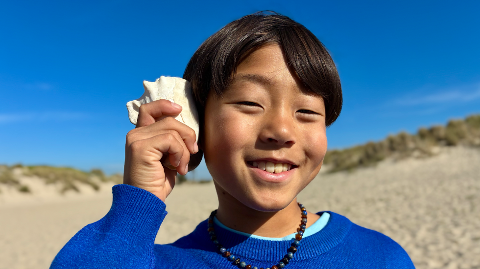 Photo taken with 48MP Fusion camera, next-generation portraits feature in use, focused on a person’s face