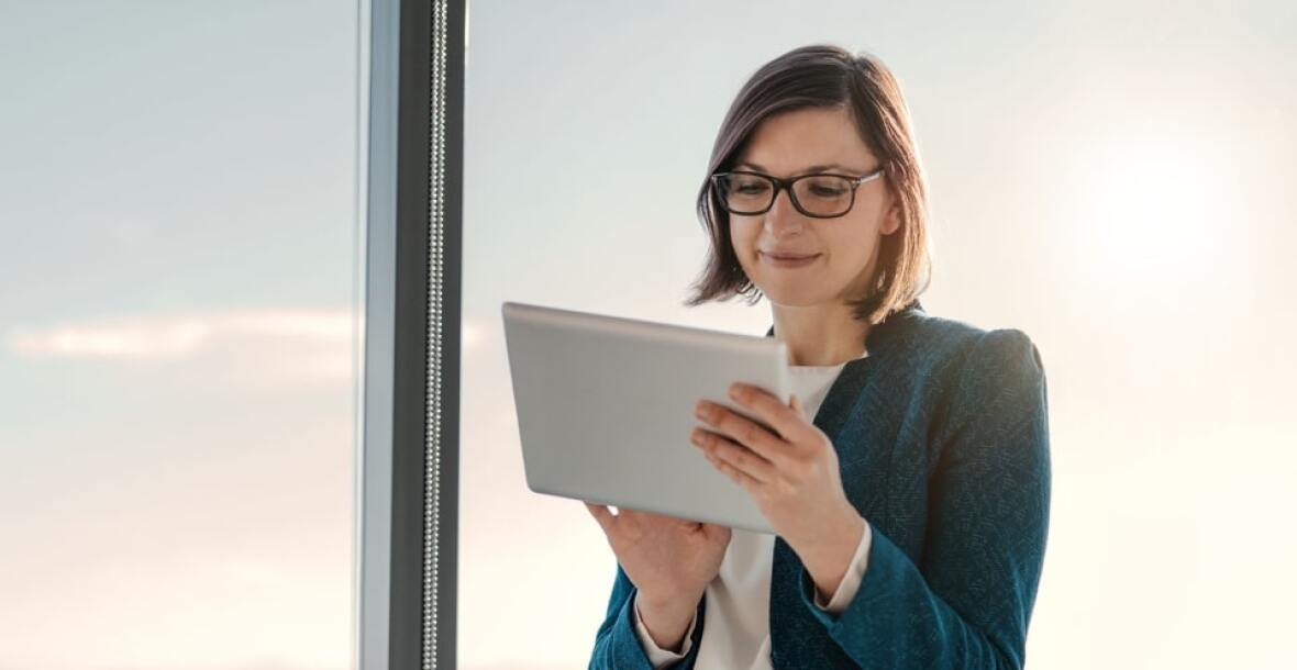 Lady looking at a tablet