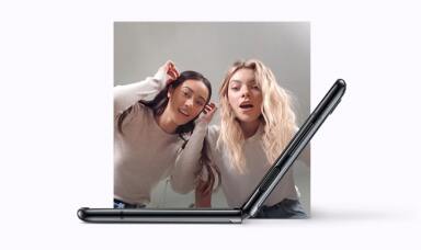 Two woman looking at Samsung Galaxy Z Flip