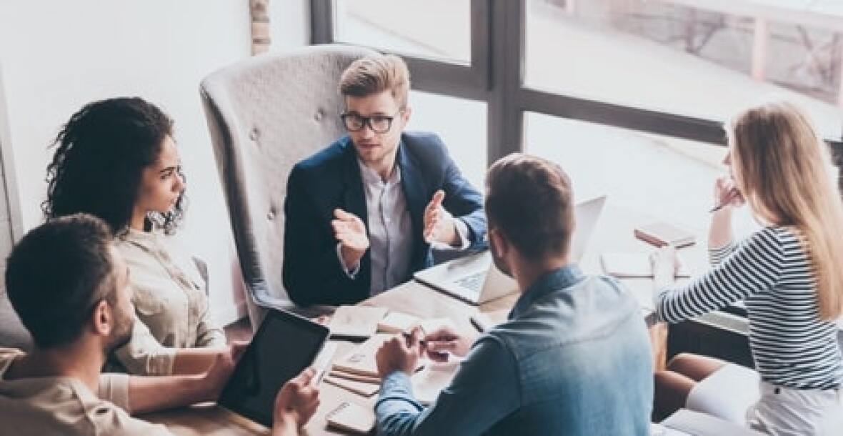 People in a group discussion in office