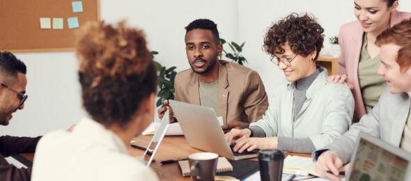 a diverse group of people in a meeting