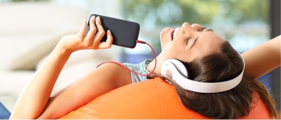 Girl listening to music on her phone