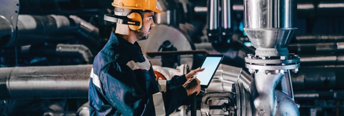 Worker in a factory using a tablet