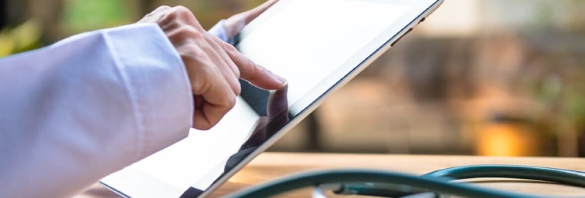 Doctor working on a tablet