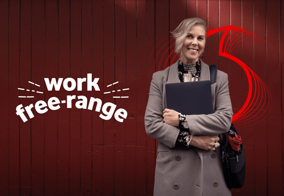 Work Free Range. Woman holding a laptop.