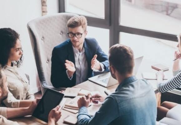 People in a group discussion in office