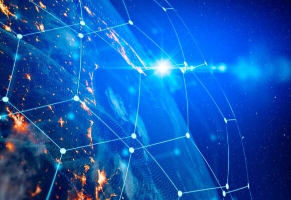 Photo of the earth showing communication links between different cities
