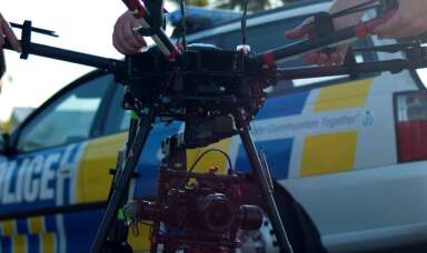 Phone of NZ police car with drone