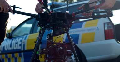 Phone of NZ police car with drone