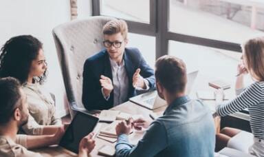 People in a group discussion in office
