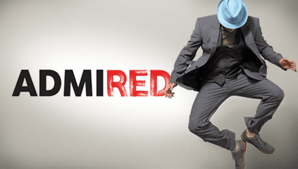 Man jumps in the air and clicks his heels