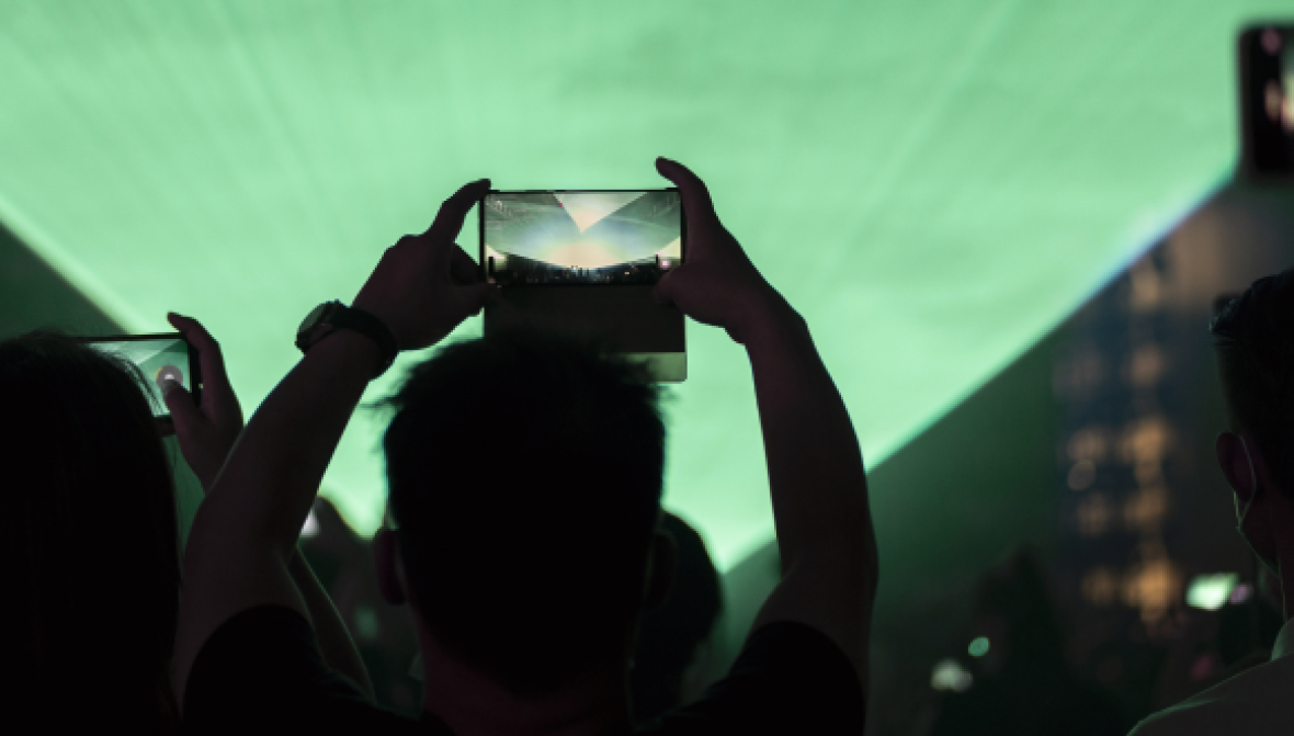 Crowd recording a live show using a phone