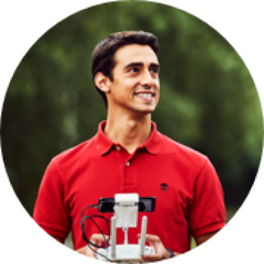 Image of person holding remote for drone