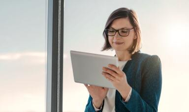 Lady looking at a tablet
