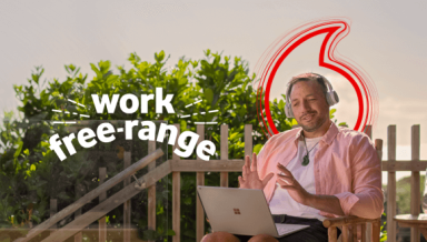 Work free-range. Men working on his laptop on his porch.