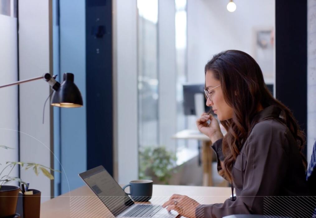 Woman sitting at her desk in the office