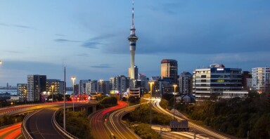 Photo of Auckland showing Sky city tower and motorways