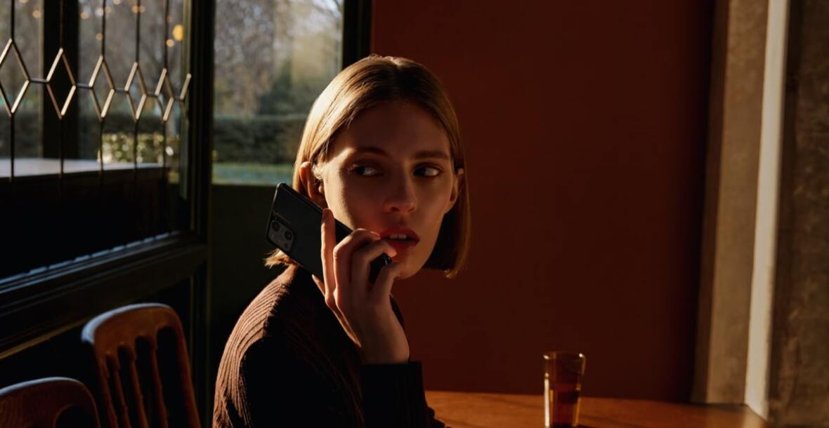 Woman holding OPPO Find X3 Pro 5G