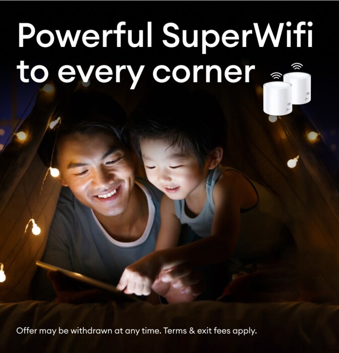 Young and old male under a dimly lighted tent on a tablet