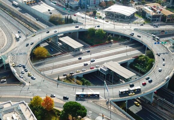 Motorway in a city showing flyovers and cars