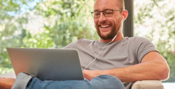 A man working remotely from home.