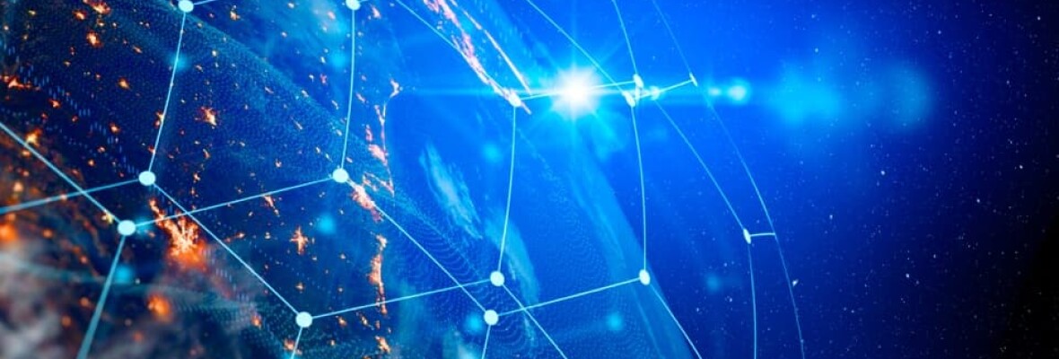 Photo of the earth showing communication links between different cities