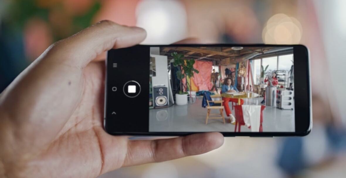 person taking multiple photos on Galaxy S20