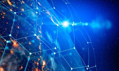 Photo of the earth showing communication links between different cities