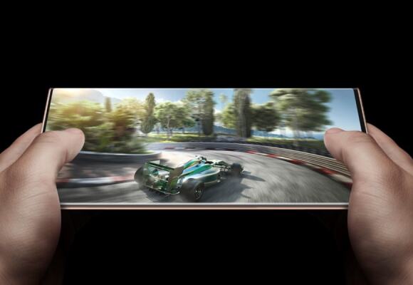 Person playing racing car game on the Note20