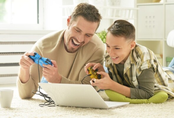 Family playing games on computer