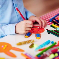 kid drawing easter bunny