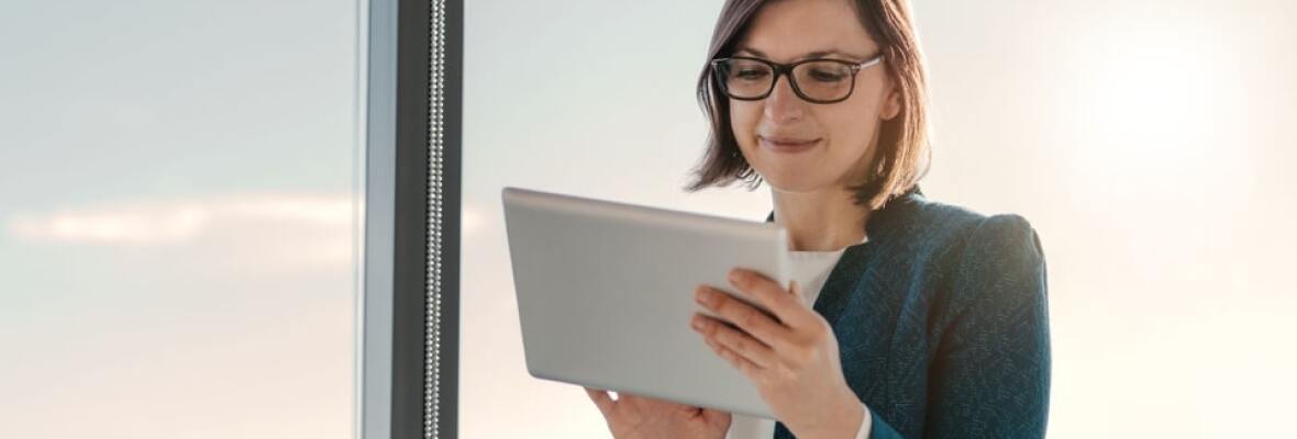 Lady looking at a tablet