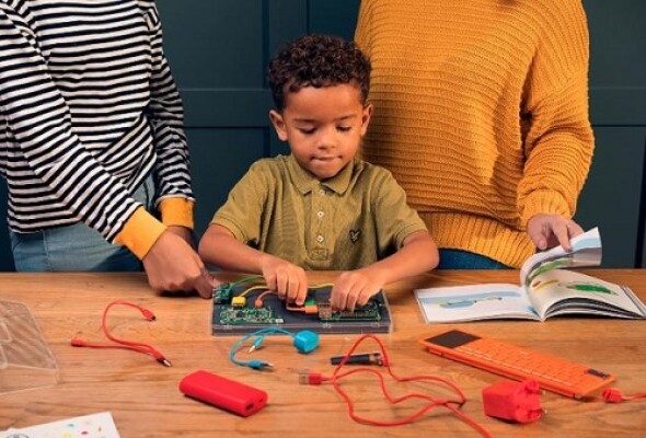 Young child building a Kano PC computer