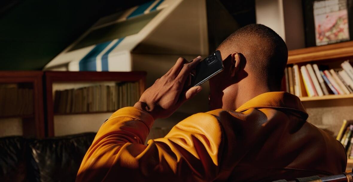 Man holding OPPO Find X3 Pro 5G