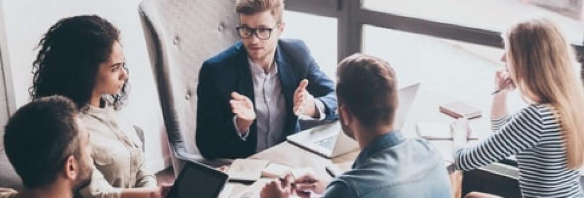 People in a group discussion in office