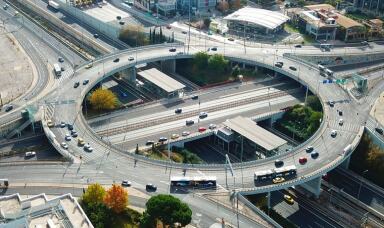 Motorway in a city showing flyovers and cars