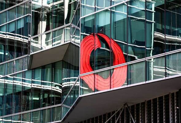 Vodafone logo reflected on glass