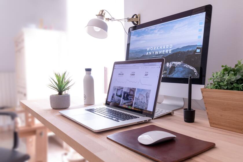 Laptop and desktop on desktop workspace | Photo by Domenico Loia on Unsplash
  