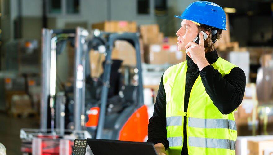 Warehouse worker on a call