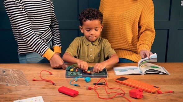 Young child building a Kano PC computer